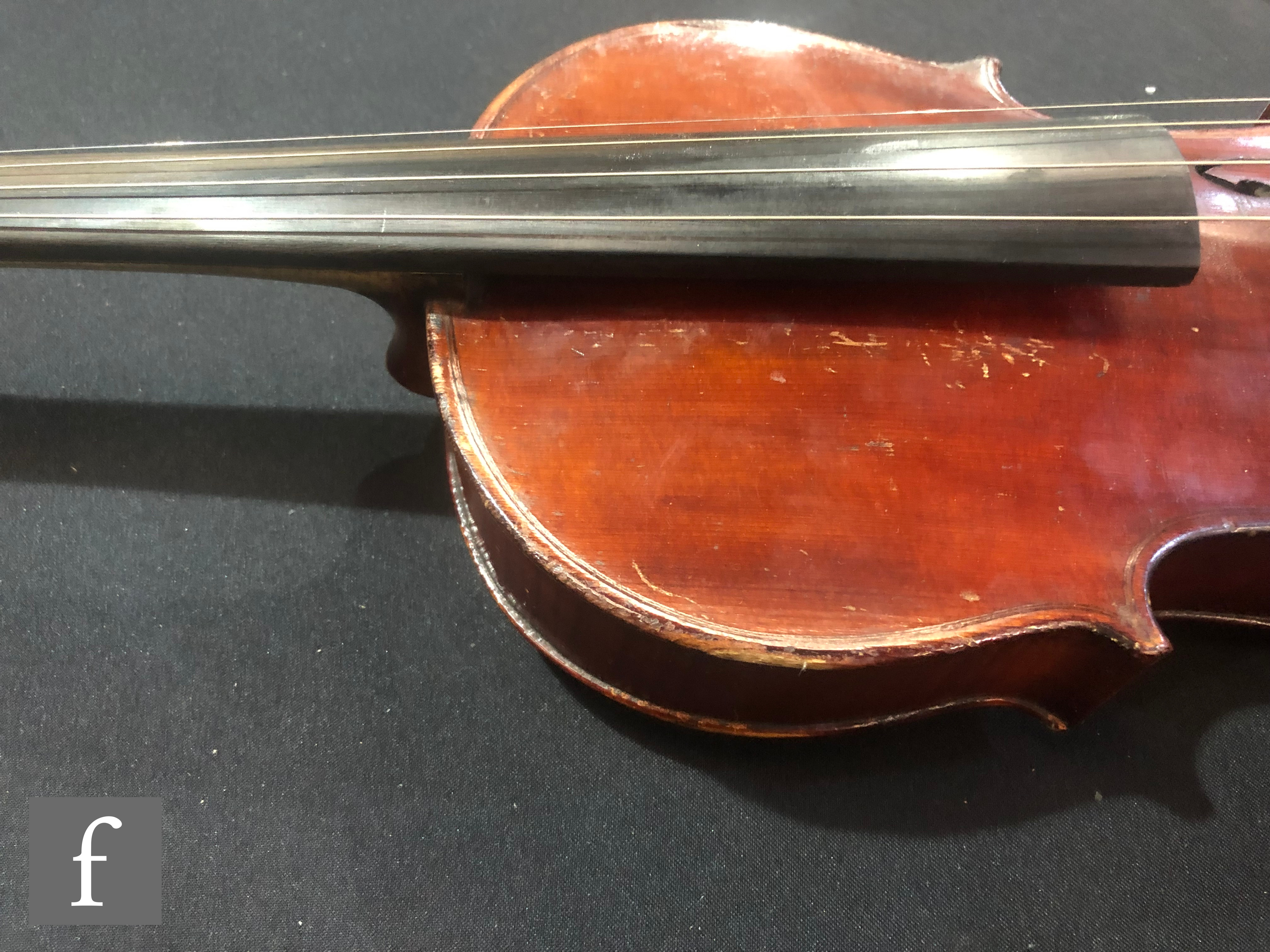 A late 19th Century German violin, length 36cm, and a bow, in later black zip case. - Image 8 of 16