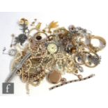 A parcel lot of assorted costume jewellery to include beads, bangles, brooches, watches etc. (qty)