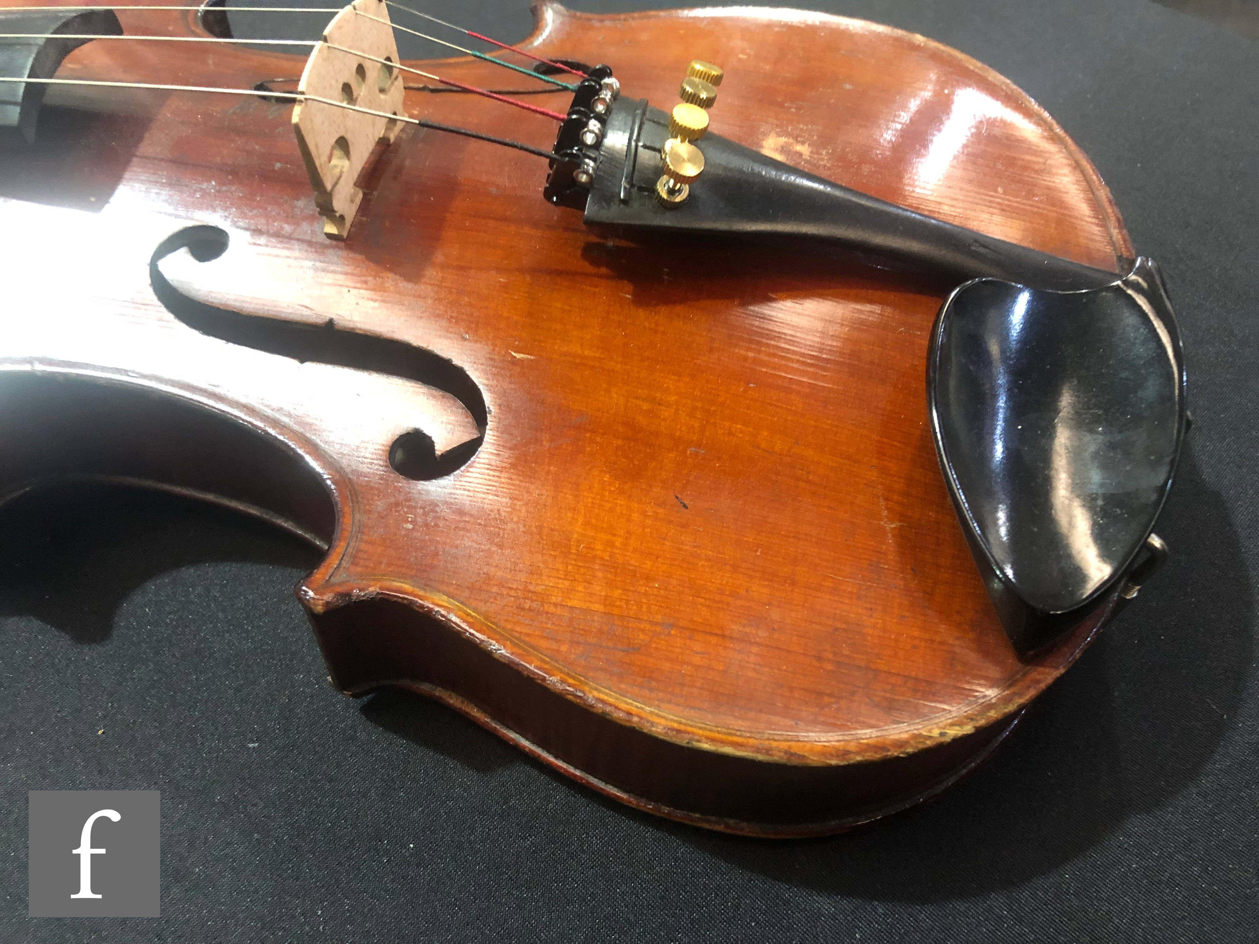 A late 19th Century German violin, length 36cm, and a bow, in later black zip case. - Image 9 of 16