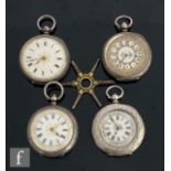 Four continental silver open faced key wind fob watches, various styles and dates, with a spider