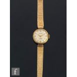 A mid 20th Century Strad manual wrist watch Arabic numerals and batons to a silvered dial, case