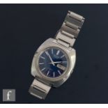 A stainless steel Seiko 7006-7090 automatic wrist watch with batons, day and date facility to a blue