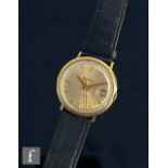 A mid 20th Century gold plated Bulova automatic wrist watch, with batons and date facility to a