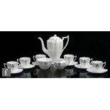 A 1930s Shelley Art Deco Queen Anne Blue Iris pattern coffee set comprising a coffee pot, six cups