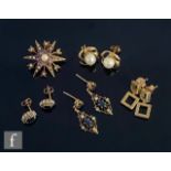 Four pairs of 9ct earrings to include stud and sapphire and diamond drop examples, with a 9ct seed