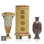 Two early 20th Century Mettlach Villeroy and Boch vases of varying form, the first of cylindrical