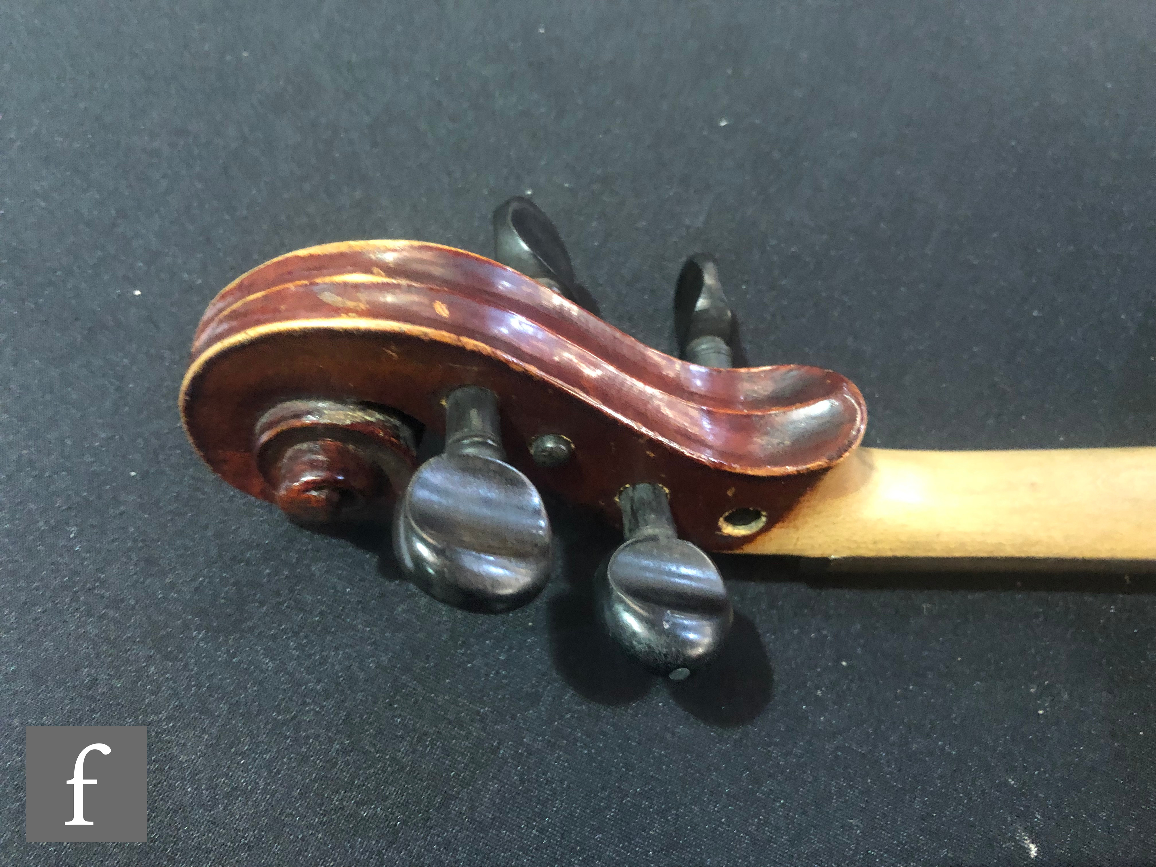 A late 19th Century German violin, length 36cm, and a bow, in later black zip case. - Image 11 of 16