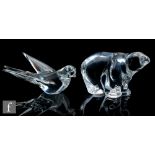 A Hadgelands clear crystal glass figure modelled as a stylised polar bear, engraved signature,