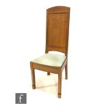 A late 20th Century Arts and Crafts style oak high back standard or side chair by Ian Laval, with