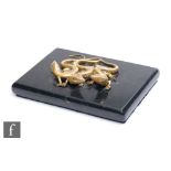 A 20th Century desk stand modelled as three gilt lizards on a rectangular black veined marble