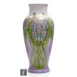 A late 19th Century Doulton Lambeth Faience vase of high shouldered form decorated with hand painted