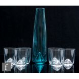 A mid 20th Century Adolf Matura for Bor Glassworks blue green bottle carafe with six clear glass