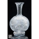 A 19th Century clear cut crystal carafe, circa 1860, the footed globe and shaft form body bright cut