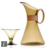 A 20th Century Kastrup glass jug designed by Jacob Bang, of conical form in a deep olive green