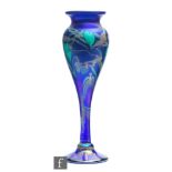 A contemporary glass Okra vase in the Viola pattern by Richard P Golding, decorated with flowers and