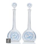 A pair of Stevens & Williams large decanters of compressed ovoid form, with blue and white enamel