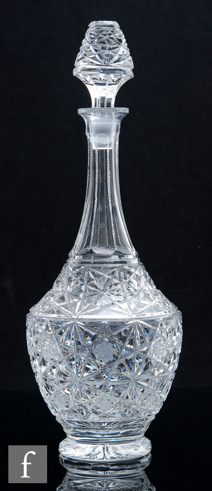 A 1950s Czechoslovakian crystal baluster form decanter, the body and matching stopper profusely