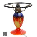 A Schneider Le verre Francais Art Deco cameo glass table lamp, the circular swept base rising to a