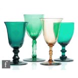 A group of three 19th Century Bristol green drinking glasses to comprise a barrel form example above