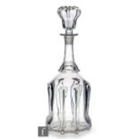 A mid 19th Century clear crystal decanter of bell form, decorated with moulded vertical bands