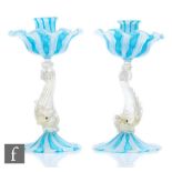 A pair of late 19th Century Italian Murano candlesticks by Salviati & Cie, the upper sconce in a