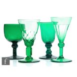 A group of four 19th Century Bristol green drinking glasses to comprise a slice cut conical bowl