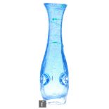 A large mid to late 20th Century continental glass of elongated baluster form, pale blue airbubble