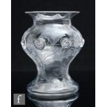 An early 20th Century Stevens & Williams clear crystal glass vase, of baluster form with flared rim,
