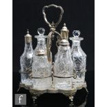 A late Georgian clear cut crystal cruet set, the matched set of bottles all with flat cut decoration