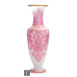 A mid 19th Century Baccarat Cameo glass vase of slender shouldered ovoid form with flared collar