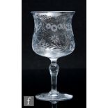 An early 20th Century rock crystal style drinking glass in the manner of Thomas Webb, the swollen