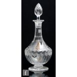 An early 20th Century Stuart and Sons glass decanter circa 1925, of footed baluster form, the body