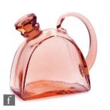 A Czechoslovakian glass decanter, circa 1930s, formed as a teapot with applied loop handle with