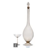 A 1920s Orrefors Astrid decanter designed by Simon Gate, the lightweight mauve-tinted  decanter