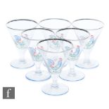 Six 20th Century French drinking glasses, the conical bowl decorated with enamel painted stylised