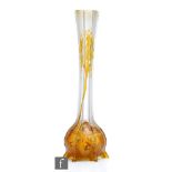 An early 20th Century Legras glass vase, of globe and shaft form with moulded vertical banding,