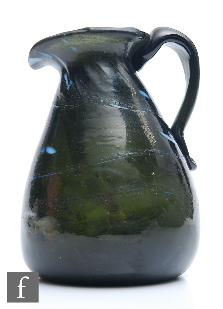 An early 19th Century Wrockwardine jug, circa 1800, of ovoid form with applied loop handle,