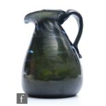 An early 19th Century Wrockwardine jug, circa 1800, of ovoid form with applied loop handle,