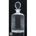 A Whitefriars Glassworks hexagonal decanter, circa 1935, the faces of the body cut with small
