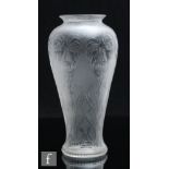 An early 20th Century clear crystal vase designed and decorated by Joshua Hodgetts for Stevens &