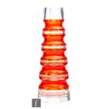 A mid 20th Century Carl Meltzer and Co stepped glass orange cased vase with facet cut bands,