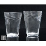 A pair of early 20th Century clear crystal glass tumblers, circa 1900, with wrythen moulded