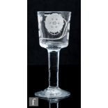 An 18th Century Jacobite drinking glass, circa 1745, the bucket form bowl engraved with a six