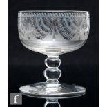 An early 19th Century Davenport Patent rummer, the cup bowl acid etched with swags and tassels,