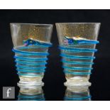 A pair of late 19th Century Italian Murano Salviati & Cie tumblers of footed flared form,