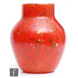 A 1930s Monart Stoneware glass vase, on a white ground with red tonal colour with multicoloured