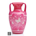 An early 20th Century Stevens and Williams twin handled vase intaglio cut with flowers and