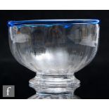A late Georgian clear crystal glass bowl, circa 1810, the footed circular body with ribbed detail
