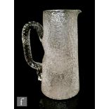 A later 19th Century continental champagne jug of tapered cylinder form, with integral spout and