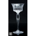 An early 20th Century Webbs rock crystal style drinking glass, the flared bucket bowl decorated with